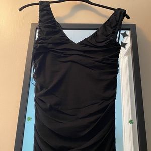 Black body hugging fitted mesh dress